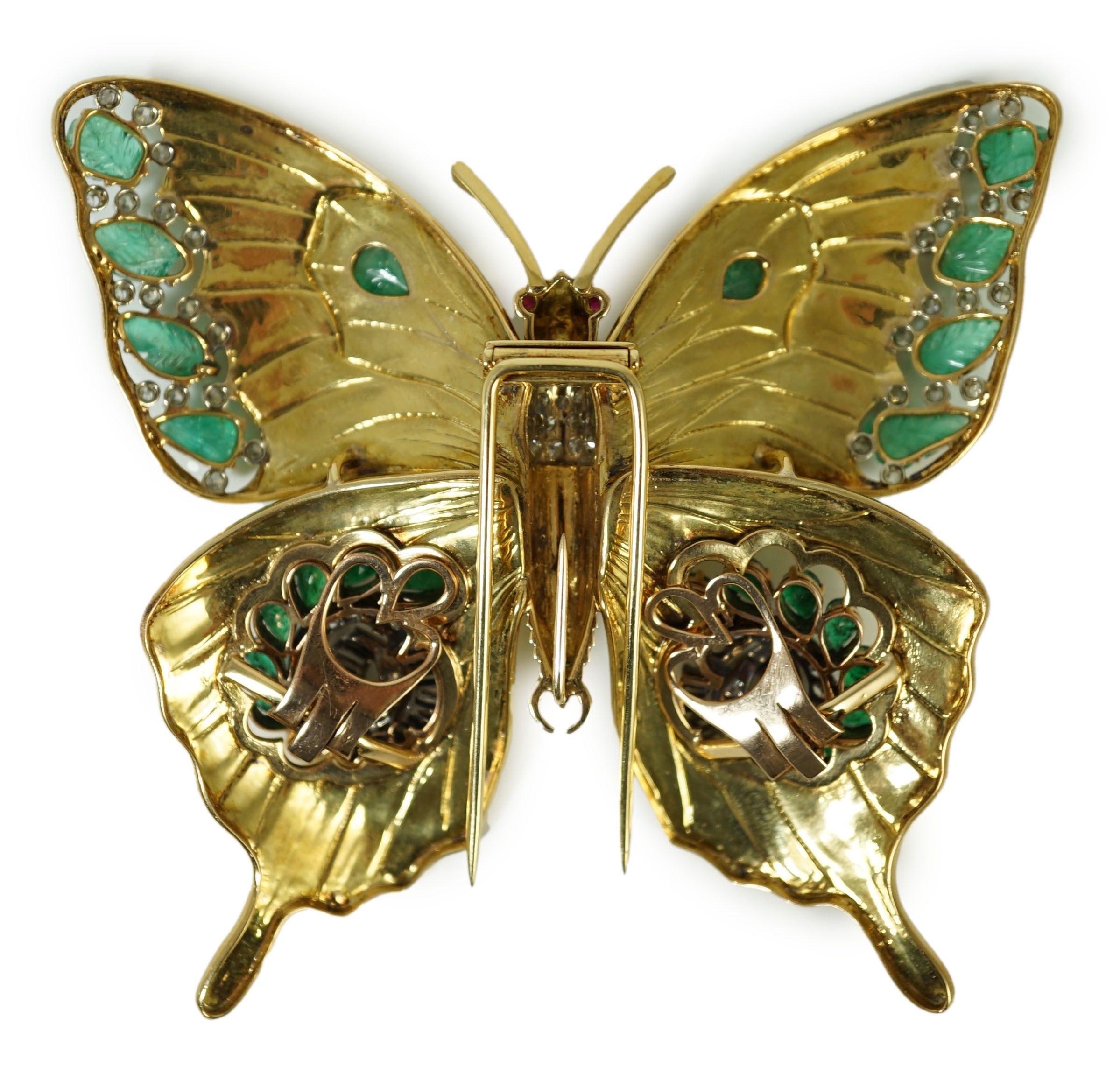 A modern 18ct gold, emerald and diamond set butterfly clip brooch